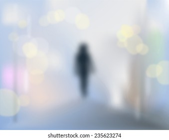 Lonely man walking in the rain