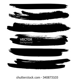 Long abstract black smears isolated on a white background