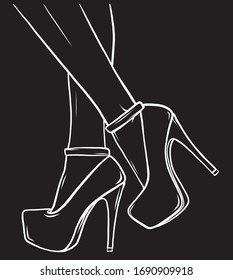 Long legs in and high-heeled shoes in black background
