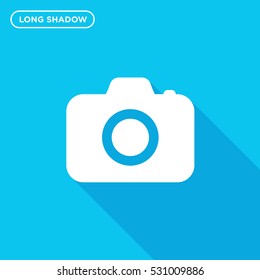 Long shadow photo camera icon illustration isolated vector sign symbol on blue background