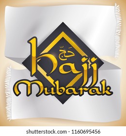 Long, white fabric ready to be used as ihram garb during Hajj (written in Arabic calligraphy) pilgrimage with black rhombus and golden sign.