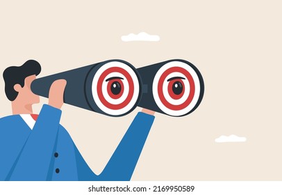 Look for business goals. Eyes on goal focused concentration to business target. A businessman looks through binoculars for a target.