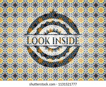 Look inside arabic style badge. Arabesque decoration.
