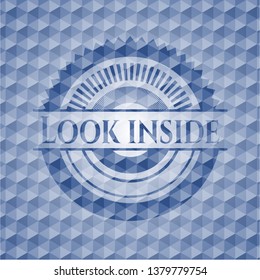 Look inside blue hexagon badge.