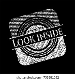 Look inside chalkboard emblem on black board