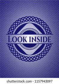 Look inside emblem with jean background