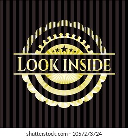                  Look inside gold badge or emblem