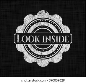 Look inside written with chalkboard texture