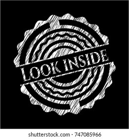 Look inside written with chalkboard texture