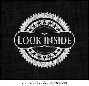 Look inside written on a chalkboard