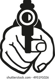 Looking in front of a gun in a hand