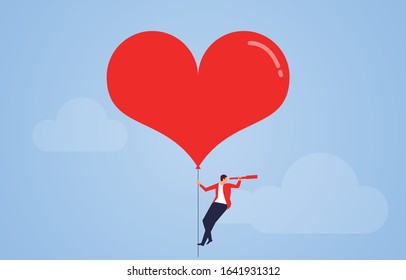 Looking for love, heart-shaped balloon pulls businessman to search in mid air