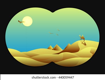 looking through binoculars in the desert to the pyramids