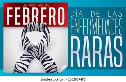 Loose-leaf calendar with zebra print ribbon and squared label reminding at you to commemorate the Rare Disease Day in the last day of February (written in Spanish).
