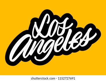 Los Angeles brush lettering sign on yellow background