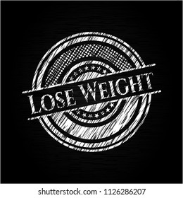 Lose Weight written on a blackboard