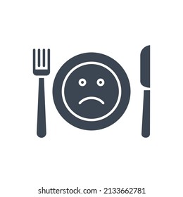 Loss of appetite related vector glyph icon. Cutlery, knife, fork and plate. On plate sad smiley. Loss of appetite sign. Isolated on white background. Editable vector illustration