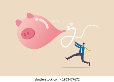 Loss money from economic crisis or stock market crash, financial problem or losing all savings pension concept, businessman running trying to catch flying deflate piggy bank balloon.