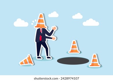 Lost in business direction, facing mistakes or failure, traps or crises ahead, risks and uncertainty concept, blindfold businessman cover with pylon walking to fall into the hole or business trap.