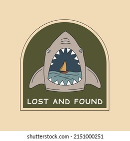 Lost and found. Shark with open mouth and sailboat inside.
