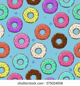 Lots of donuts in a colored glaze on a blue background. Seamless texture. 