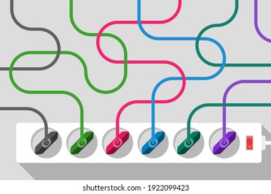 Lots of electrical household appliances plugged to power strip, with tangled colored power cords. Concept of rules for using of electrical equipment and safety in the house