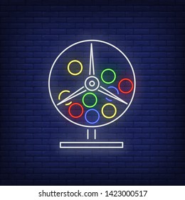 Lottery machine with balls inside neon sign. Gamble, lotto, entertainment design. Night bright neon sign, colorful billboard, light banner. Vector illustration in neon style.
