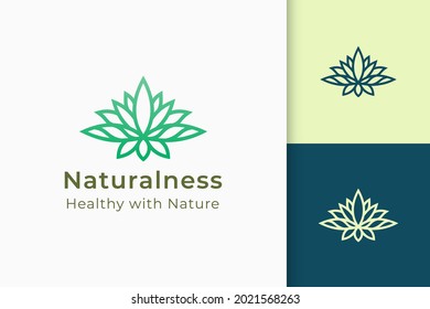 Lotus flower logo in glamor and luxury for beauty or cosmetic