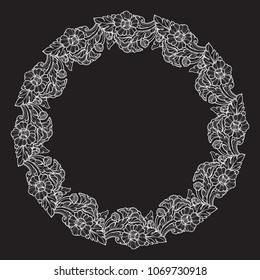 Lotus flowers arranged in intricate circular frame. Popular decorative motif in South-Eastern Asia. Tattoo design. Linear drawing isolated on black background. EPS10 vector illustration