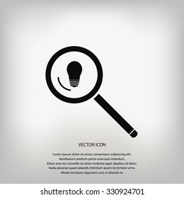 loupe and light bulb icon