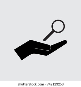 loupe on the hand, vector icon