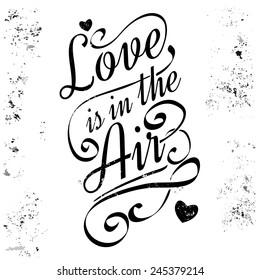 Love is in the air. Calligraphic lettering, grunge style.