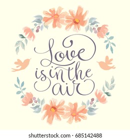 Love is in the air. Calligraphy, birds and wreath. Hand made vector illustration