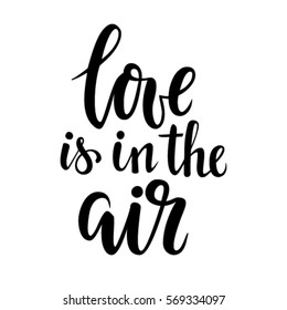 Love is in the air. Hand drawn calligraphy and brush pen lettering. design for holiday greeting card and invitation of the wedding, Valentine's day and Happy love day.