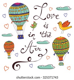 Love is in the air. Hand drawn card with air ballooons and handwritten words