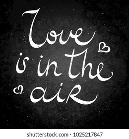 Love is in the air. Hand drawn vector lettering phrase. Modern motivating calligraphy decor for wall, poster, prints, cards, t-shirts and other