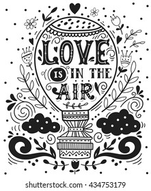 Love is in the air. Hand drawn vintage print with a hot air balloon and hand lettering. Illustration for greeting card for Valentine's day or wedding, print on t-shirts and bags, stationary or poster.