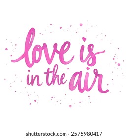 "Love is in the air" hand-lettered in a vibrant pink watercolor style, accented with delicate splatters and a small heart.