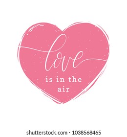 Love Is In The Air handwritten phrase in heart shape. Valentine's day lettering for card, poster etc. 8 March calligraphic vector illustration on romantic background.