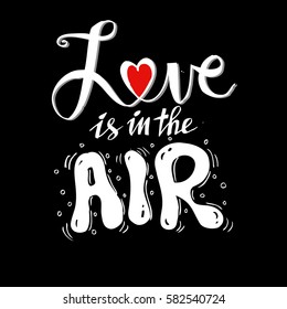Love is in the air inscription. Hand drawing calligraphy.
