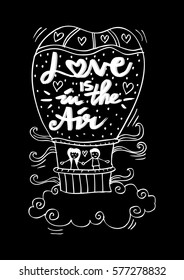  Love is in the air lettering With Couple In Hot Air Balloon.
