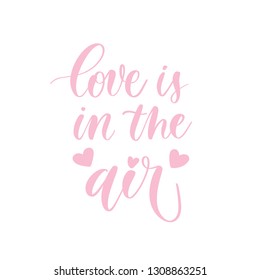 Love is in the air - pink hand lettering  card  with hearts. Vector illustration.Calligraphy inscription.