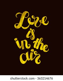 Love is in the air postcard. Vector illustration for Valentine Day. Gold foil quote on black background. Vintage hand-drawn lettering.