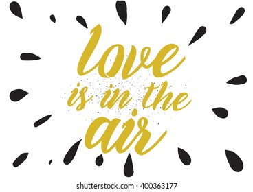 Love is in the air romantic inscription. Greeting card with calligraphy. Hand drawn lettering design. Photo overlay. Typography for banner, poster or apparel design. Vector typography.