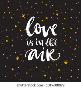 Love is in the air. Valentines day calligraphy gift card. Gold stars on texture background. Hand drawn design elements. Handwritten modern brush lettering. Vector illustration.