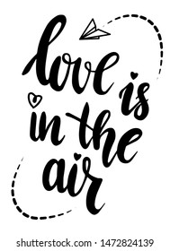 Love is in the air. Vector lettering typography with flying paper plane on white background. Valentines day or wedding card