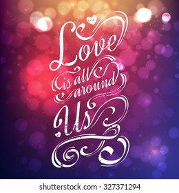 Love is all around us. Calligraphic lettering with bokeh lights.