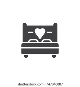 Love bed with heart icon vector, filled flat sign, solid pictogram isolated on white. Sex, making love symbol, logo illustration.