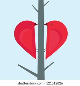 Love birds on a tree forming a shape of a heart