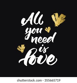 Love card design with hand lettering 'All you need is love'. Golden sparkling hearts on black background. Typographic design for wedding invitation, love card or Valentine's greeting card.